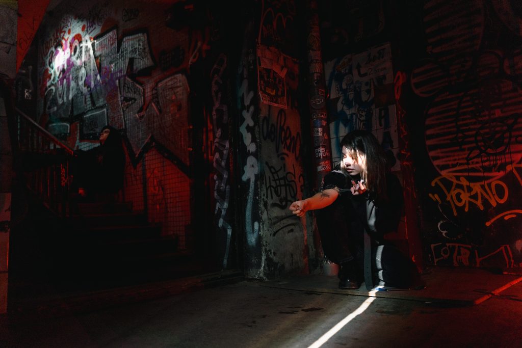 Girl In a dark place doing drugs